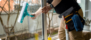 man doing professional home cleaning service